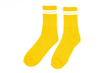 Pair of yellow socks isolated on white