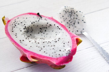 slice of dragon fruit on a chopping board.