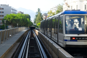Fototapeta na wymiar Metro tracks at City of Lausanne on a sunny summer day. Photo taken August 11th, 2021, Lausanne, Switzerland.