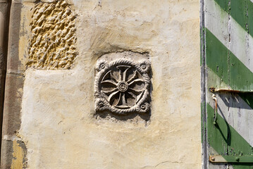 Close-up of facade with ornament at the old town of City of Nyon on a sunny summer day. Photo taken August 11th, 2021, Nyon, Switzerland.