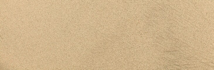 Panorama of Clean brown fine sand for use as a background