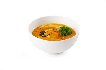 Bowl of pumpkin soup with parsley