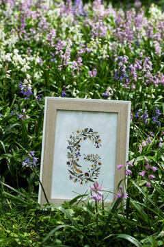 Details of floral letter G, decorations for a woodland naming ceremony