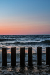 Obraz premium Sunset on the sea coast