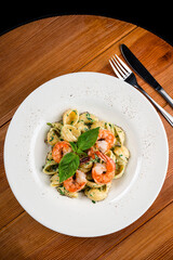 Delicious Italian pasta with shrimp and spinach
