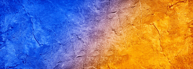 Blue orange yellow abstract background. Toned rock texture background with copy space for design. Wide banner. Bright, vibrant, beautiful, colorful, beauty, fashion. Ice fire.