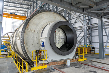 View of the large sag and ball mill in the mine factory. A ball mill is a type of grinder used to...