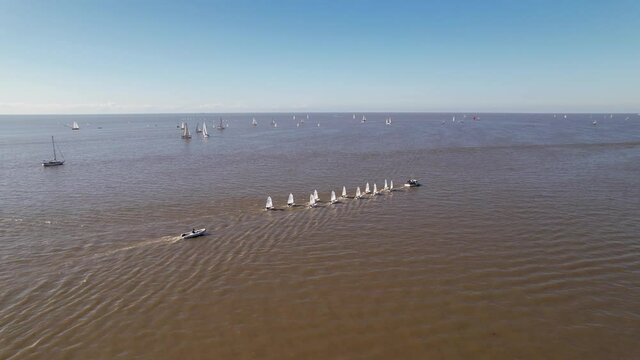 Aerial view of optimist boats, special boats for children. navigating the river.