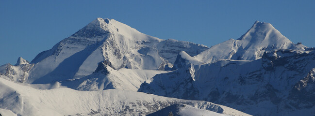 Mountain ranges of the Bernese Oberland in winter. Altels, Balmhorn and other high mountains.