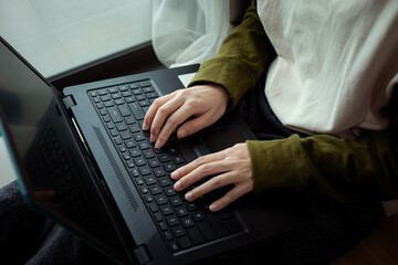 Closeup woman working remotely at home, Man typing on laptop or computer