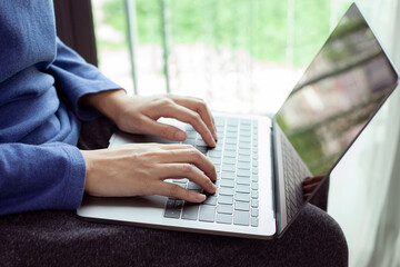 Closeup woman working remotely at home, Man typing on laptop or computer