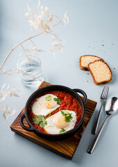 shakshuka scrambled eggs with tomatoes in Arabic