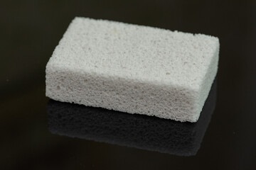  white pumice stone  on black background