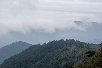 The mountains in the distance were filled with fog