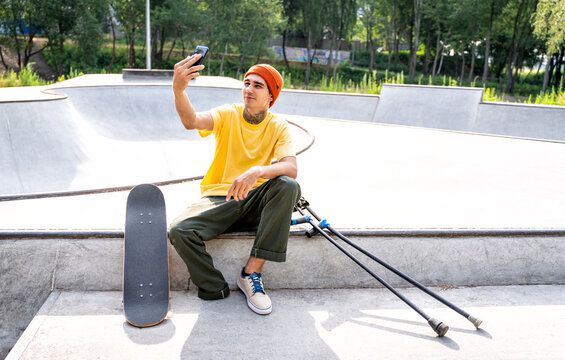 Amputated Skater Spending Time At The Skatepark