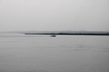 Fototapeta premium view of the oil refinery from the Volga River