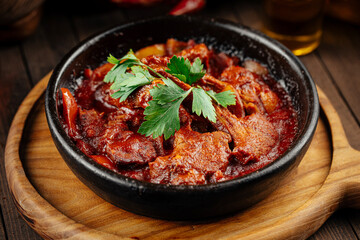 Pan of georgian lamb entrecotes in adjika sauce