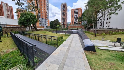 Inflection Park in the village with buildings. Medellin, Antioquia, Colombia.