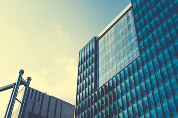 Closeup of skyscraper in USA. Modern architecture with blue glass