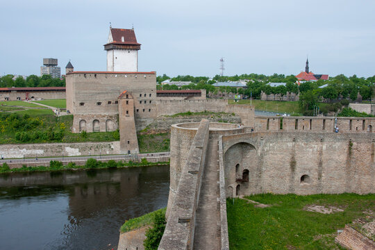Russia. Ivangorod. Types of Ivangorod. Ivangorod fortress. In the background is the Narva Fortress.