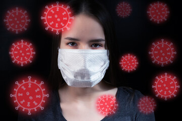 covid microbes surround a woman in a protective medical mask