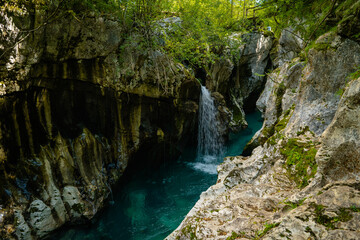 Beautiful turquoise mountain river. Soca (Isonzo), Julian Alps, Slovenia. Popular touristic destination.