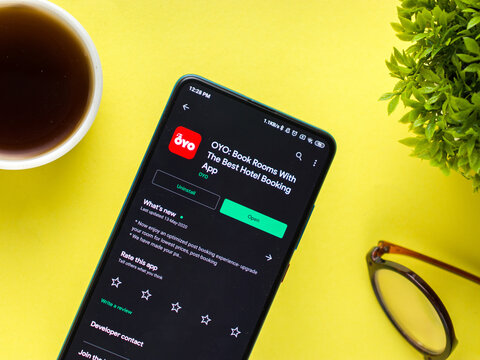 Assam, India - August 6, 2021 : Oyo logo on phone screen stock image.