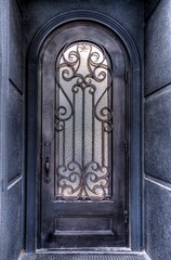 doorway with old door with ornate metalwork