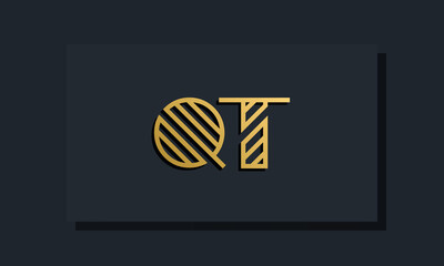 Elegant line art initial letter QT logo.