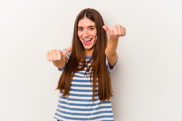 Fototapeta na wymiar Young caucasian woman isolated on white background raising both thumbs up, smiling and confident.