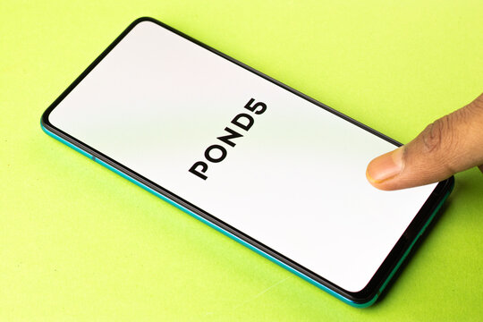 Assam, india - April 19, 2021 : Pond5 logo on phone screen stock image.