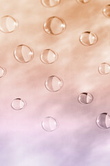 Drops of gel form the background. The concept of beauty