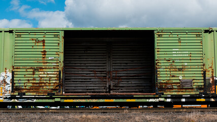 doors open on an empty railcar 