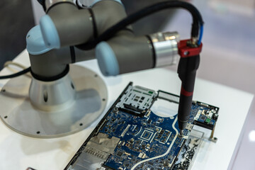 robot arm working in factory