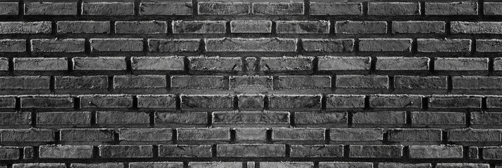 Brick wall dark background. Panoramic view
