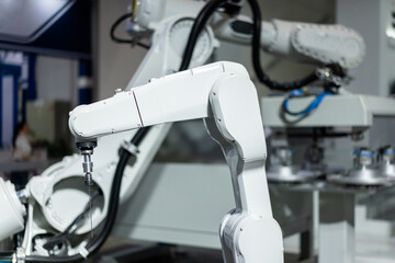 robot arm working in factory