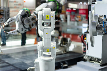 robot arm working in factory