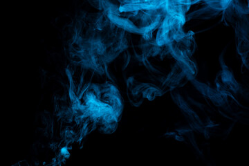 Blue abstract smoke isolated on black background,  cloud of steam on dark background