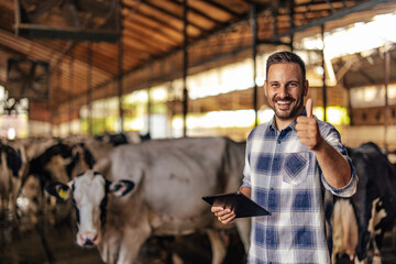 Adult man, noting the quality of the milk.