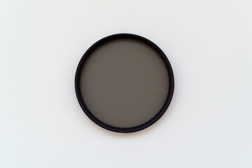 cpl polarization filter for photo video cameras on white background
