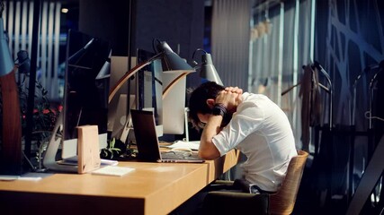 Tired Worker Overworked On Computer.Frustrated Businessman Working Alone.Office Work Overtime. Workaholic Work In Internet Deadline.Tired Businessman In Office.Overwhelmed Exhausted Stressed Employee