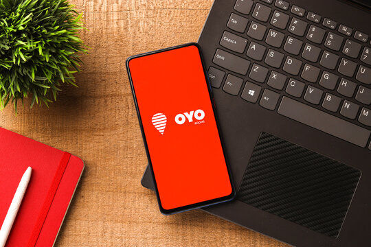 Assam, India - August 6, 2021 : Oyo logo on phone screen stock image.