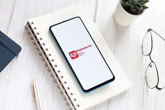 Assam, india - May 04, 2021 : Pinduoduo logo on phone screen stock image.
