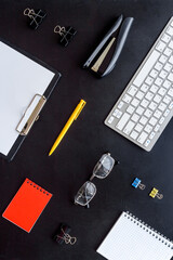 Office or home workspace with computer keyboard. Top view