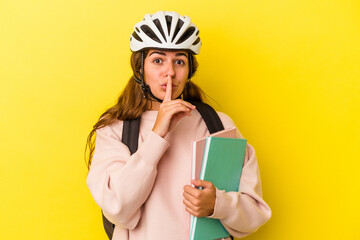 Young caucasian student woman wearing a bike helmet isolated on yellow background  keeping a secret or asking for silence.