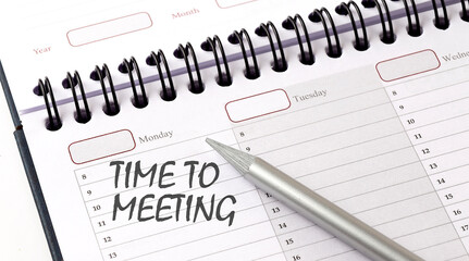 TIME TO MEETING on the planner with pencil, business concept