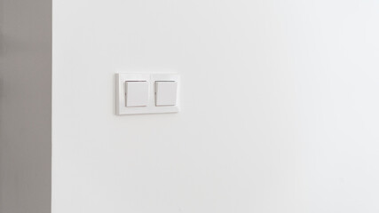 Switch light at wall, closeup to interior details.