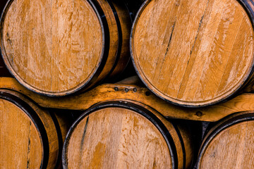 Kentucky bourbon barrels aging at a distillery. 