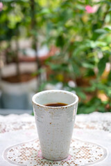 Romantic morning. Relaxing moment with a cup of coffee on a table