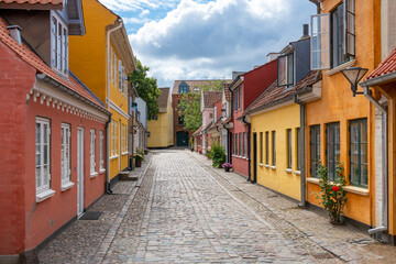 Odense, Denmark; Aug 2, 2021 - The world famous writer Hans Christian Andersen's iconic yellow childhood home. The building is now a museum of the poet's personal belongings.